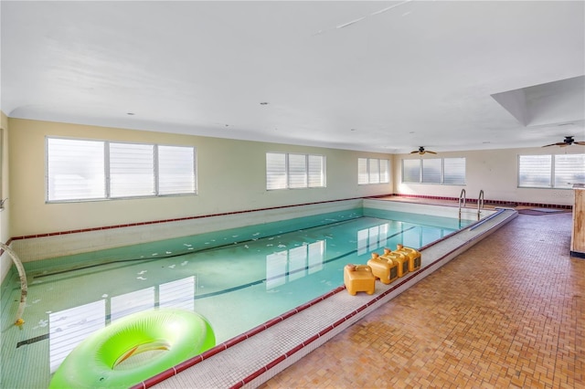 view of swimming pool with ceiling fan