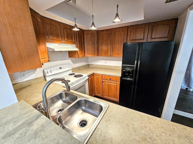 kitchen with a tray ceiling, sink, black fridge with ice dispenser, and electric range