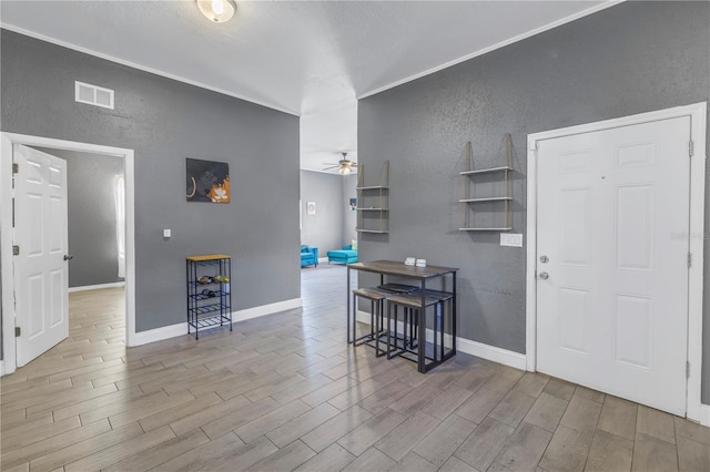 foyer with ceiling fan