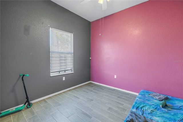 unfurnished bedroom featuring ceiling fan