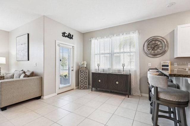 interior space with light tile patterned floors