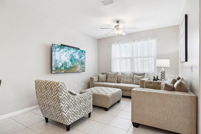 living room with light tile patterned flooring and ceiling fan