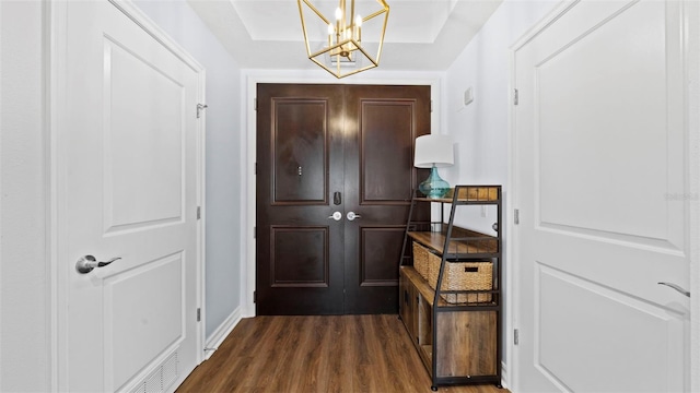 entryway with dark hardwood / wood-style floors