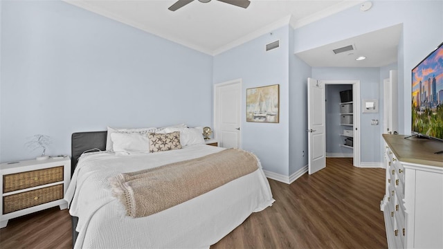 bedroom with ceiling fan, crown molding, and dark hardwood / wood-style flooring