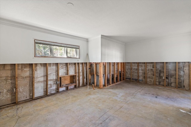 unfurnished room with ornamental molding