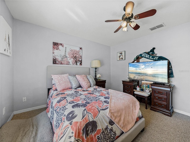 bedroom featuring ceiling fan and light colored carpet