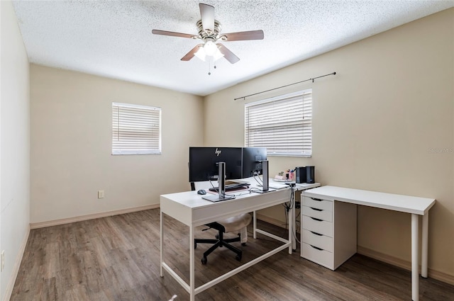 office area with ceiling fan, hardwood / wood-style floors, and a textured ceiling