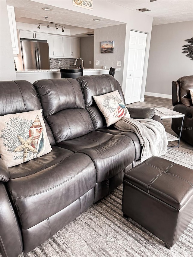 living room with hardwood / wood-style flooring