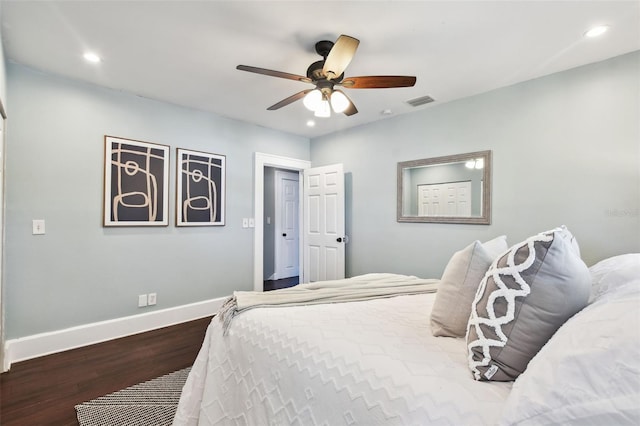 bedroom featuring wood-type flooring and ceiling fan