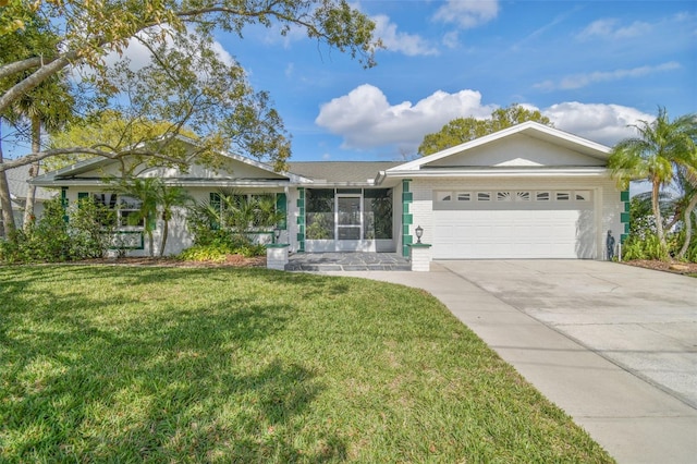 single story home with a garage, a front lawn, concrete driveway, and brick siding