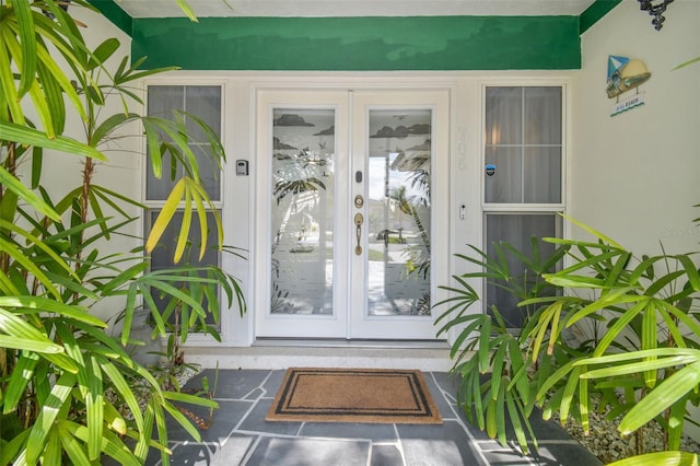 doorway to property featuring french doors