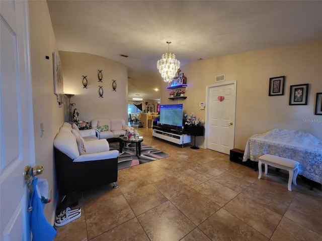 living room with a notable chandelier