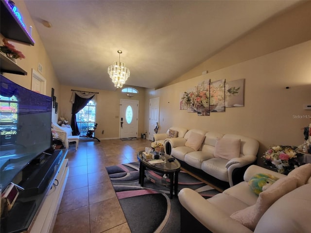 tiled living room featuring vaulted ceiling and a chandelier