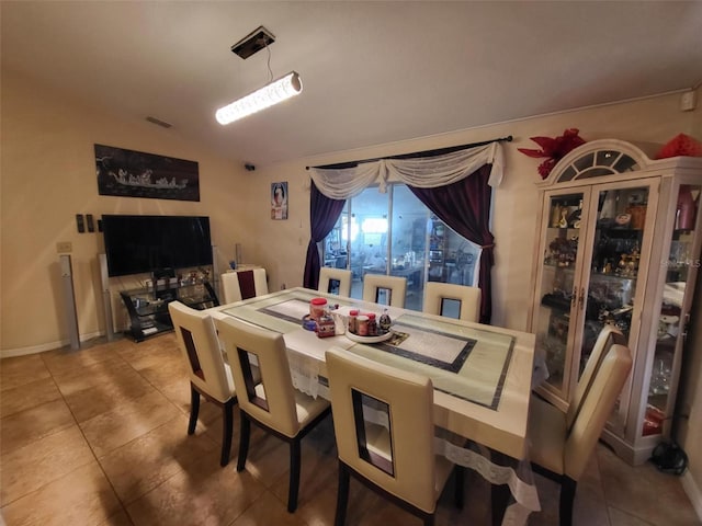 view of tiled dining space