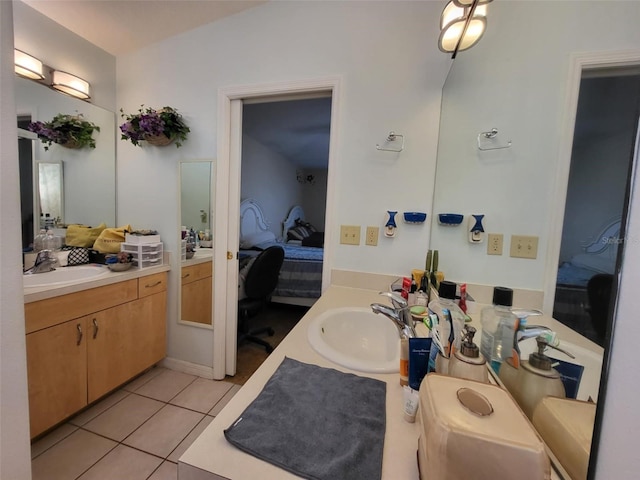 bathroom with vanity and tile patterned floors