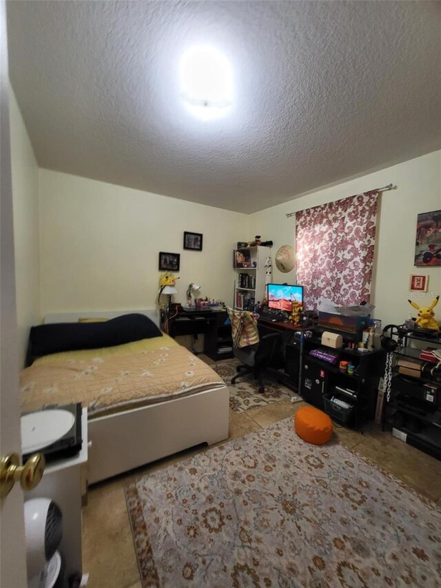 bedroom with a textured ceiling