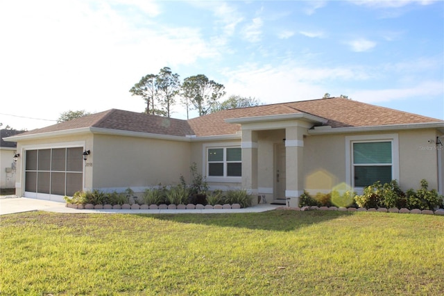 prairie-style house with a garage and a front yard