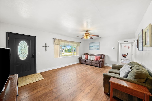 entrance foyer with hardwood / wood-style flooring and ceiling fan