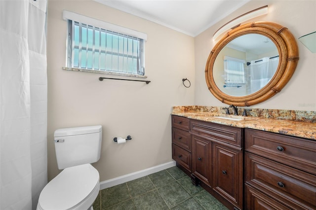 bathroom featuring crown molding, tile patterned floors, vanity, and toilet