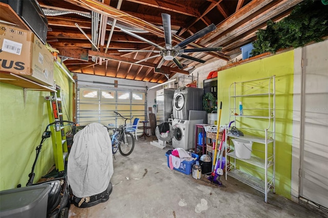 garage featuring stacked washer and dryer