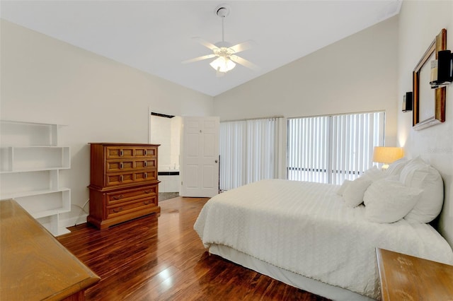 bedroom featuring lofted ceiling, dark wood-type flooring, and ceiling fan