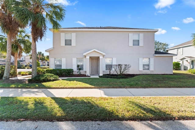 view of front of house with a front lawn