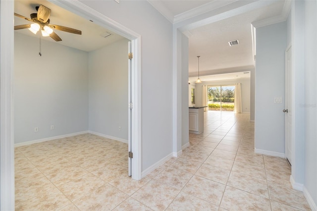 corridor featuring ornamental molding and light tile patterned floors