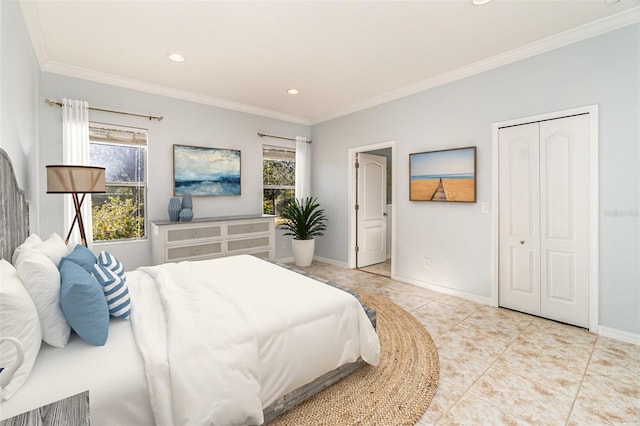 bedroom with crown molding, a closet, and light tile patterned flooring