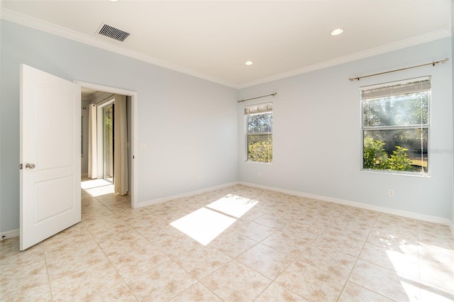 tiled empty room with crown molding