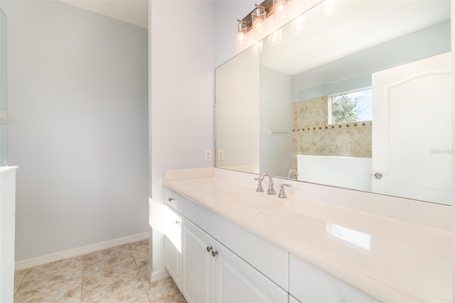 bathroom featuring tile patterned floors and vanity