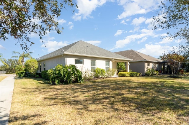 view of property exterior featuring a lawn