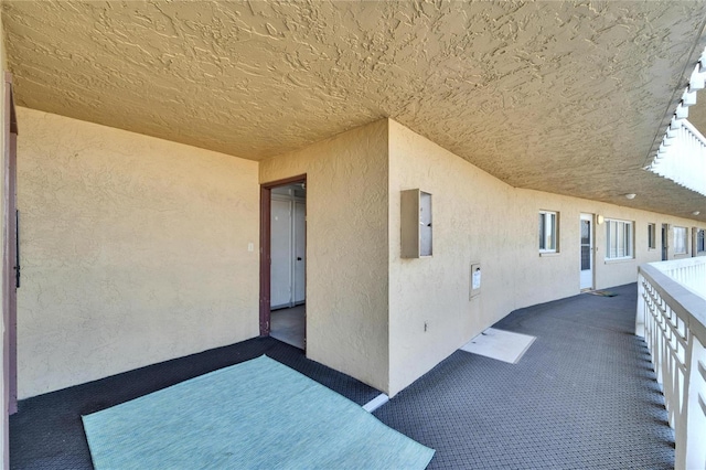 view of patio / terrace with a balcony