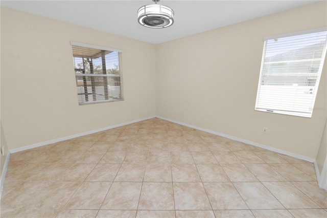 empty room featuring light tile patterned flooring