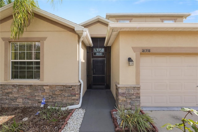 entrance to property with a garage