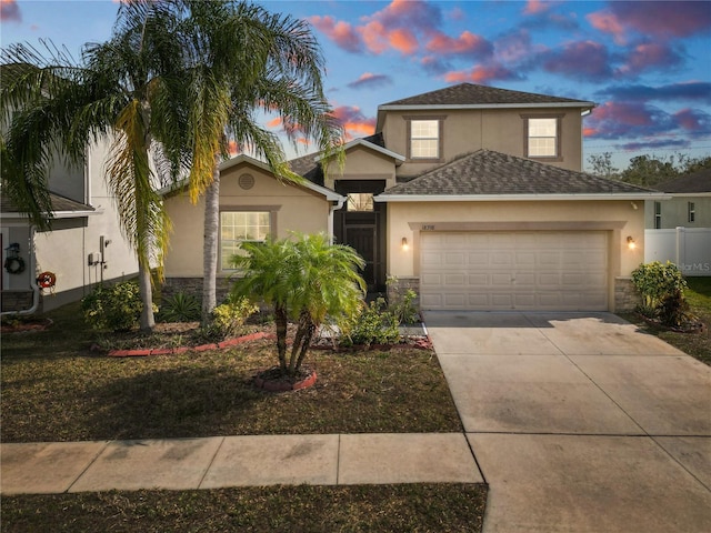 18398 Aylesbury Ln, Land O Lakes, FL 34638 - view of front facade featuring a garage
