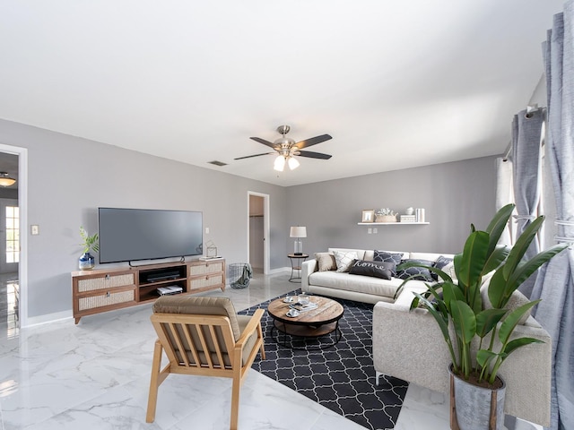 living room with ceiling fan