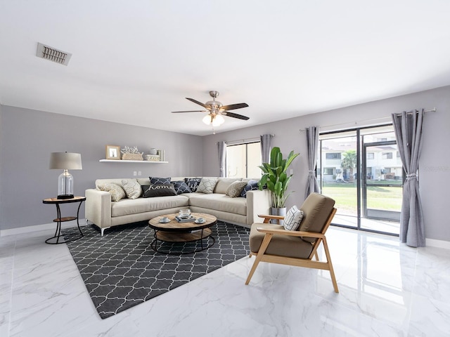 living room with ceiling fan