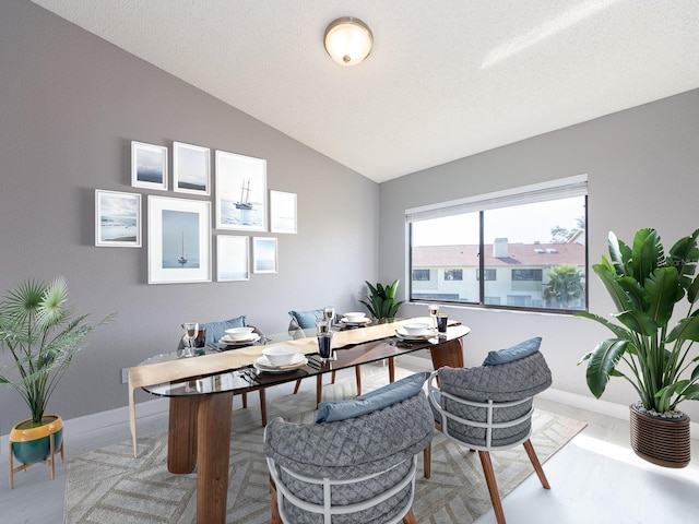 office with vaulted ceiling and a textured ceiling