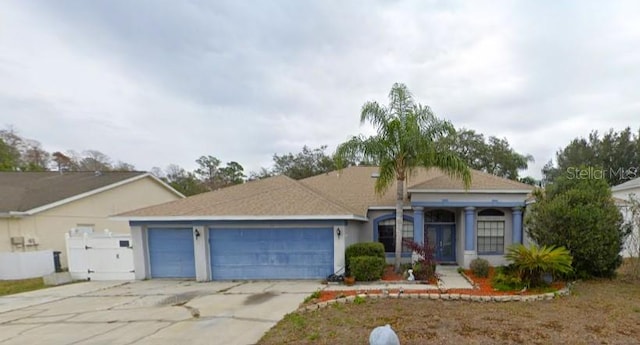 view of front of home with a garage