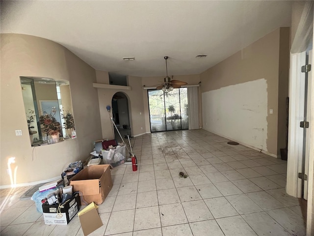 dining area with ceiling fan and light tile patterned floors