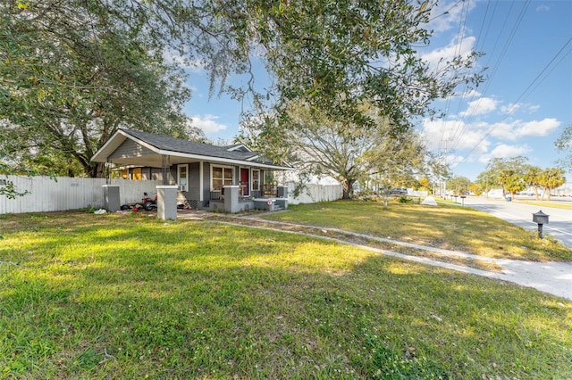 view of yard with covered porch