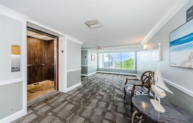 134 Mariner Dr Unit 134, Tarpon Springs, FL 34689 - sitting room with elevator, ornamental molding, and dark carpet