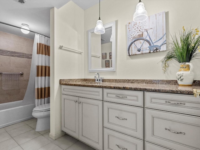 134 Mariner Dr Unit 134, Tarpon Springs, FL 34689 - full bathroom featuring vanity, shower / bath combo, tile patterned floors, and toilet