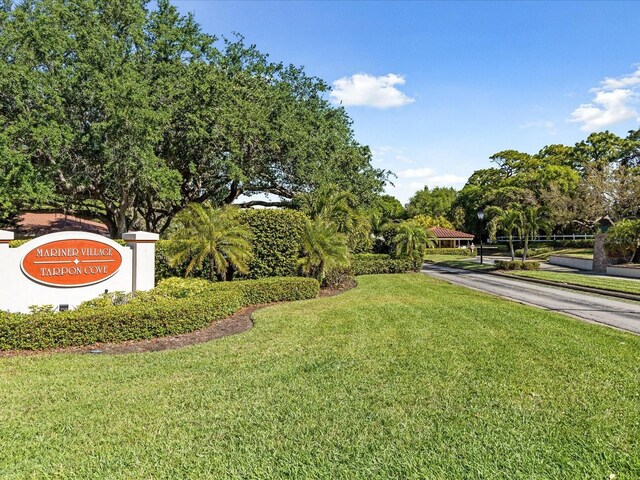 134 Mariner Dr Unit 134, Tarpon Springs, FL 34689 - view of home's community featuring a lawn