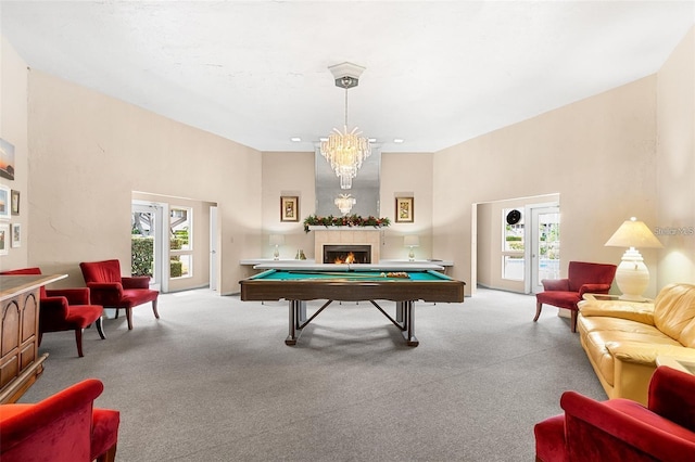 134 Mariner Dr Unit 134, Tarpon Springs, FL 34689 - playroom featuring a high ceiling, a wealth of natural light, light colored carpet, and billiards