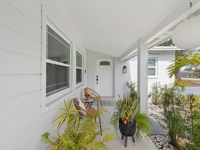 doorway to property with a porch