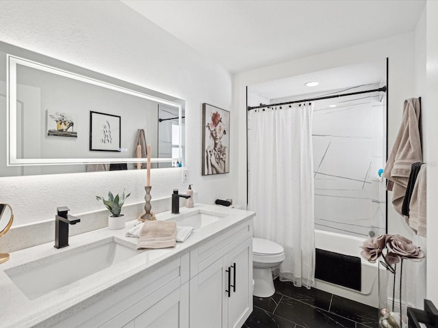 full bathroom featuring shower / bath combination with curtain, vanity, and toilet