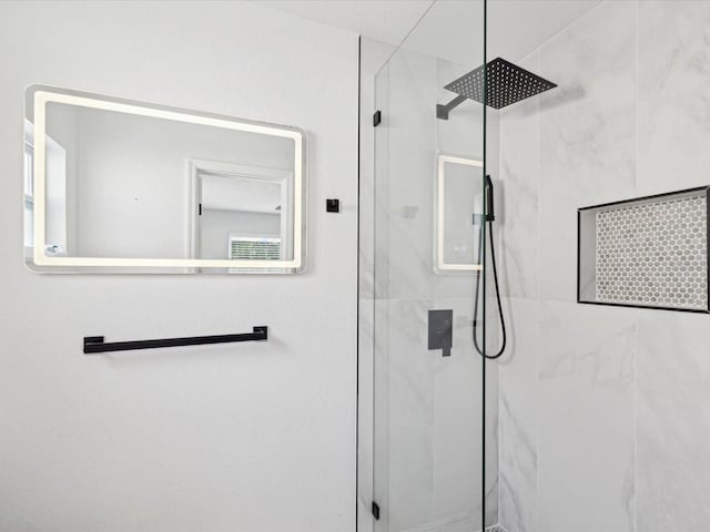 bathroom with walk in shower