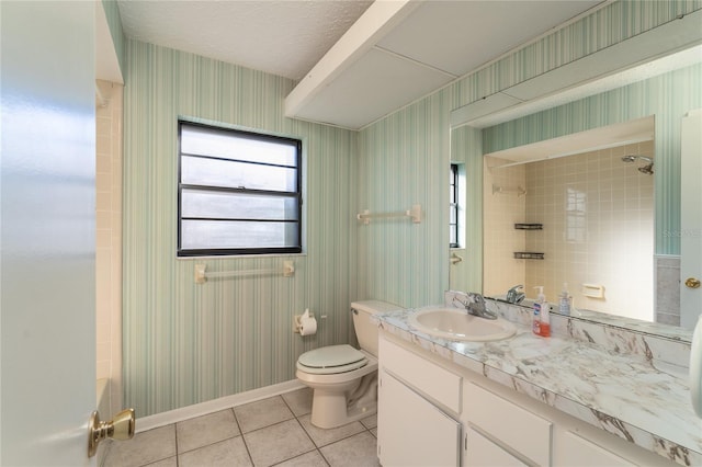 full bathroom featuring shower / tub combination, tile patterned flooring, vanity, a textured ceiling, and toilet