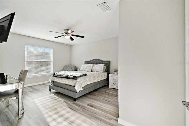 bedroom featuring ceiling fan and light wood-type flooring